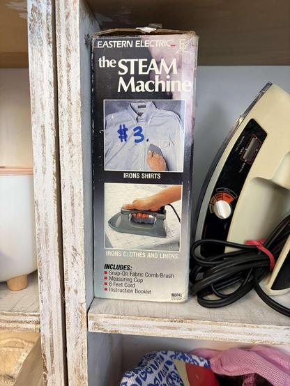 Коробка з-під праски з написом "The STEAM MACHINE"